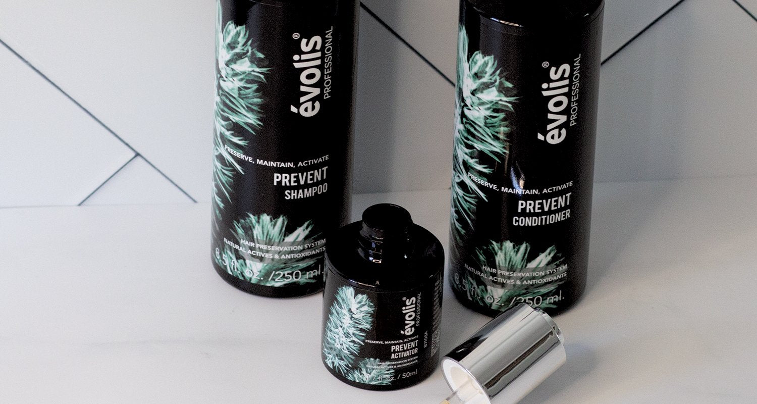 Close up image of the Evolis Prevent 3 Step System (activator, shampoo & conditioner)